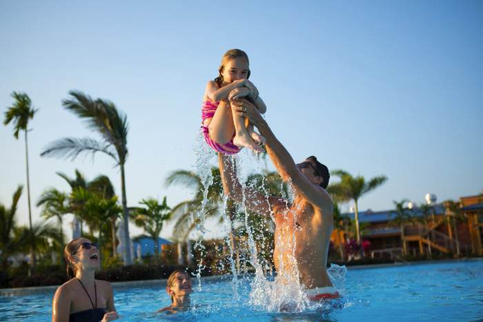 NCL Harvest Caye Pool Family ©Stephen Beaudet.jpg